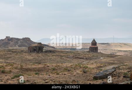 A ruined mediaeval Armenian city Ani, Kars Province, Turkey. Citadel (distant left), Apostles church (centre); Polatoglu church (right) Stock Photo