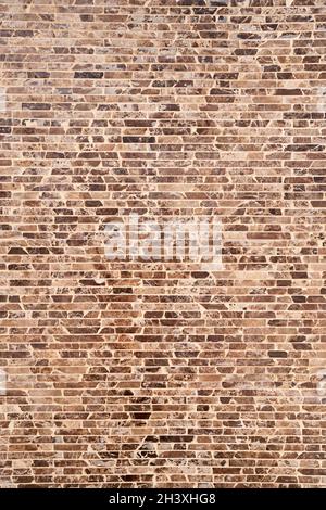 Brown and black brick wall. Close-up Stock Photo
