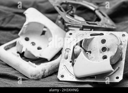 Real plastic light old electrical outlets in black and white Stock Photo