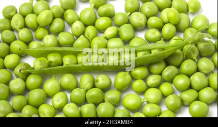 Sweet peas scattered on a white background. Stock Photo