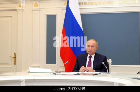 Moscow, Russia. 30th Oct, 2021. Russian President Vladimir Putin, attends the G20 Summit leadership meeting via video conference from the Kremlin October 30, 2021 in Moscow, Russia. Credit: Evgeniy Paulin/Kremlin Pool/Alamy Live News Stock Photo