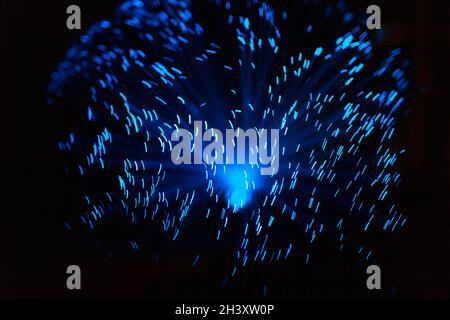 Blue abstract particles and lines with bokeh and blur in dark background Stock Photo