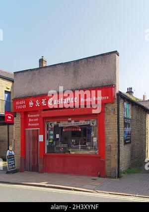 Traditional english local butchers shop in brghouse town centre Stock Photo