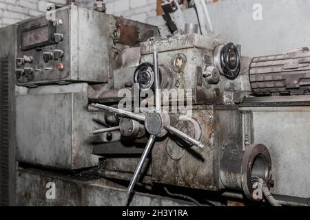 Lathe revolver old machine equipment for locksmith work in an industrial plant. Stock Photo