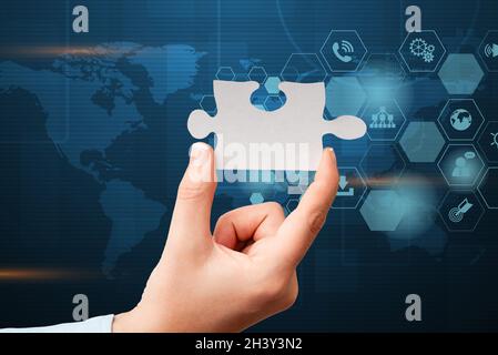 Hand Holding Jigsaw Puzzle Piece Unlocking New Futuristic Technologies. Palm Carrying Puzzles Part Displaying Solving Late Innov Stock Photo