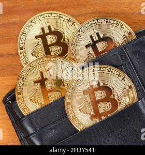 Bitcoin cryptocurrency online pay in a wallet wallet digital money cryptocurrency economy finance square Stock Photo