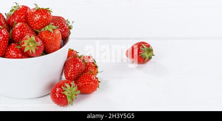 Strawberries berries fruits strawberry berry fruit bowl on wooden board panorama Stock Photo