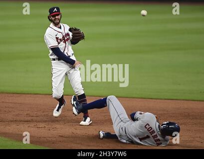 Atlanta, United States. 30th Oct, 2021. Atlanta Braves second baseman Ozzie Albies (L) forces Houston Astros Carlos Correa at second base during the third inning of game four in the MLB World Series at Truist Park on Saturday, October 30, 2021 in Atlanta, Georgia. Atlanta leads Houston 2-1 in the World Series. Photo by David Tulis/UPI Credit: UPI/Alamy Live News Stock Photo