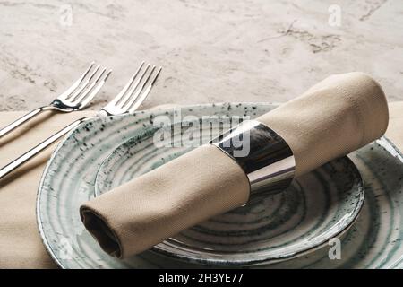 Ceramic stylish tableware set on grey background Stock Photo