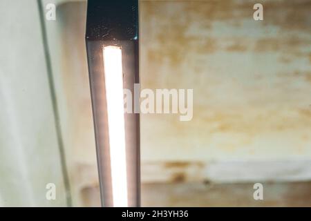 Black decorative lamp hanging from the ceiling Stock Photo