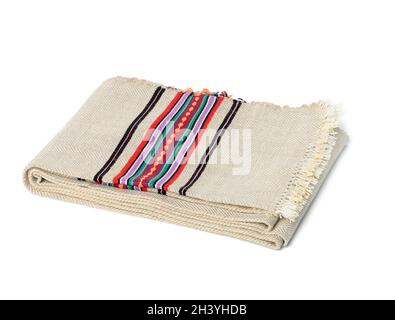 Folded gray linen tea towel on white background Stock Photo