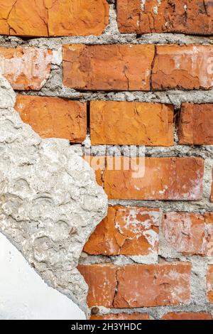 Embossed texture of an old facade brick wall Stock Photo