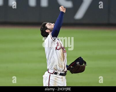 Dansby Swanson #7 of the Atlanta Braves looks on from third base during a  pitching change in the sixth inning during MLB g…