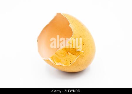 Brown broken egg shells, cracked egg shells, isolated on white background Stock Photo