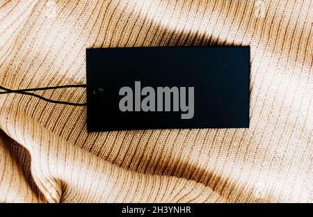 Horizontal clothing tag on soft fabric Stock Photo