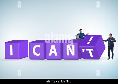 Determination concept with rotating cubes and businessman Stock Photo