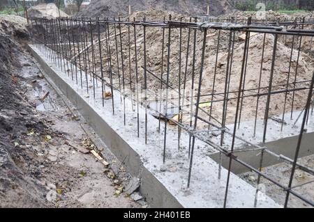 Reinforcement in a strip foundation. Foundation construction. Stock Photo