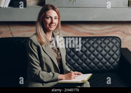 Business woman young adult coach at office. Stock Photo