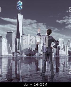 Businessman pressing virtual dollar button Stock Photo