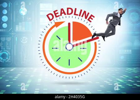 Businessman in deadline and time management concept Stock Photo