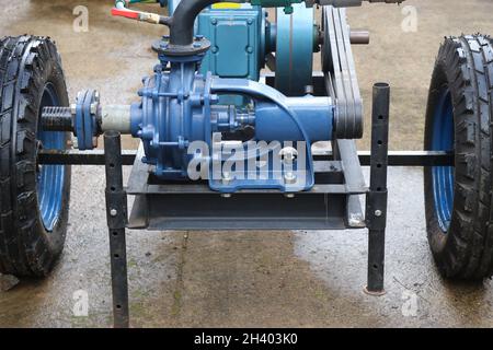 Diesel powered water pump with belt drive, Heavy duty water pump set with stand for agricultural irrigation Stock Photo