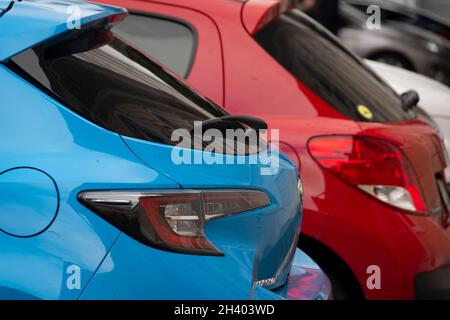 Rear corner of two cars, Wellington, North Island, New Zealand Stock Photo