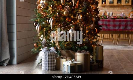 Banner view of wrapped gifts under Christmas tree Stock Photo