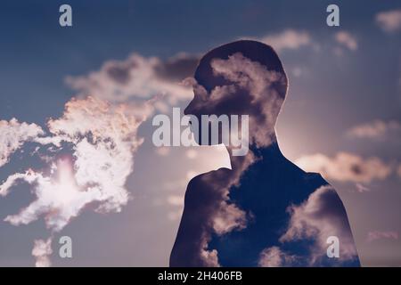 Psychology concept. Sunrise and woman silhouette head Stock Photo