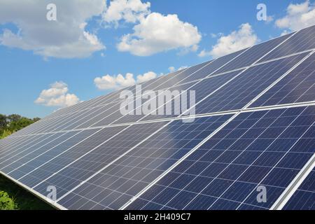 View on solar panels  surface background with beautiful clouds sky Stock Photo
