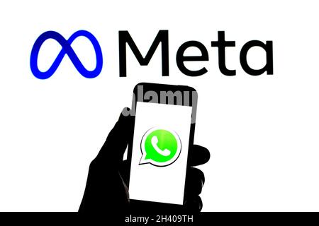Barcelona, Catalonia, Spain. 30th Oct, 2021. In this photo illustration a WhatsApp logo seen displayed on a smartphone with a Meta logo in the background. (Credit Image: © Thiago Prudencio/DAX via ZUMA Press Wire) Stock Photo