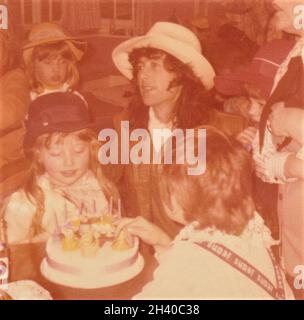 Jimmy Page of Led Zeppelin At A Kids Birthday Party, 1977 Stock