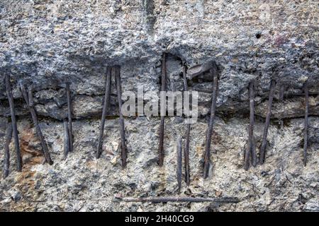 Weathered stone wall texture with scratches and cracks Stock Photo