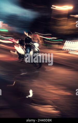 traffic at night. Long exposure photography of cars passing in the city of Rome Stock Photo