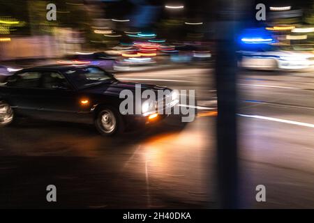 Police car in motion in Rome Italy, blurred background Stock Photo