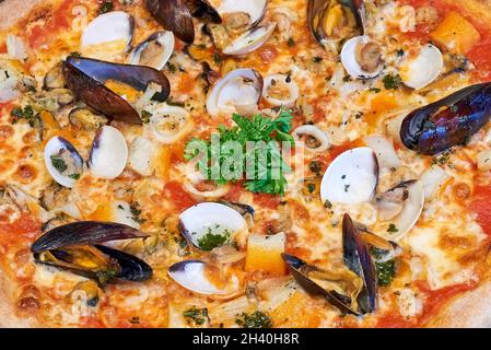 Overhead close-up shot of textured Siciliana pizza Stock Photo - Alamy