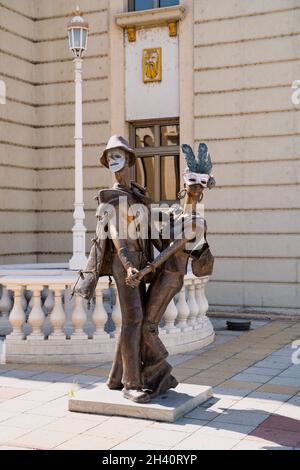 SKOPJE, NORTH MACEDONIA - AUGUST 19, 2021: Bronze statue of historical figures on Vardar river bridge in Skopje Stock Photo