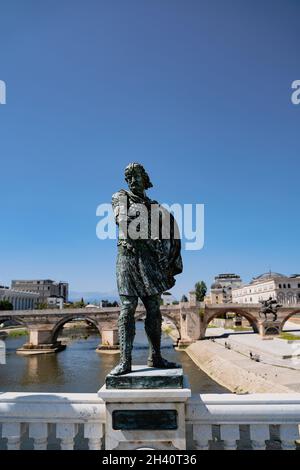 SKOPJE, NORTH MACEDONIA - AUGUST 19, 2021: Bronze statue of historical figures on Vardar river bridge in Skopje Stock Photo