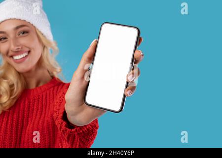 Woman showing empty smartphone screen close up to camera Stock Photo