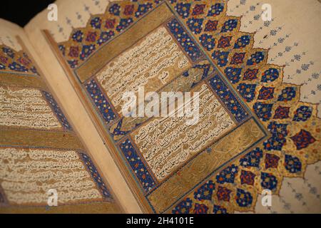 ISTANBUL, TURKEY - AUGUST 8, 2021: Close up of open Quran on display in the museum collection of Topkapi Palace Stock Photo
