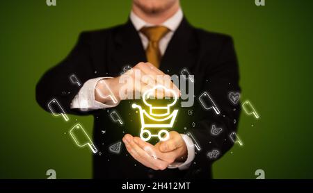 Hand holding food related icons Stock Photo