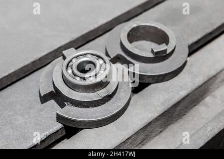 Under-pin gears iron engine mechanism industrial part. Stock Photo