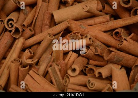 Natural dried bark cinnamon in front of spice shop in the Turkish bazaar in Akko (Acre) in Israel Stock Photo