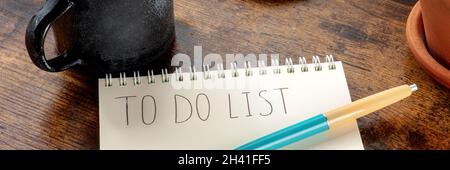 To do list panorama with a ballpoint pen on a wooden background Stock Photo