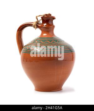 rustic jug isolated on white background Stock Photo