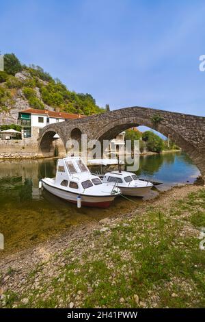Old Bridge in Rijeka Crnojevica River near Skadar Lake - Montenegro Stock Photo