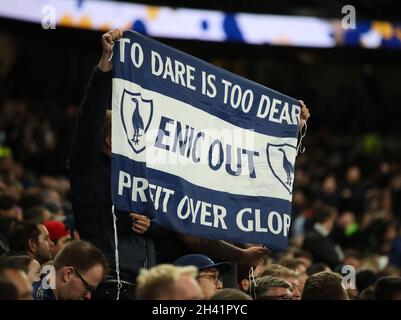 LONDON, ENGLAND - OCTOBER 30: Tottenham Hotspur fans hold up an ENIC Out banner during the Premier League match between Tottenham Hotspur and Manchester United at Tottenham Hotspur Stadium on October 30, 2021 in London, England. (Photo by MB Media)