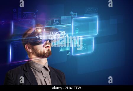 Businessman looking through Virtual Reality glasses, tech concept Stock Photo