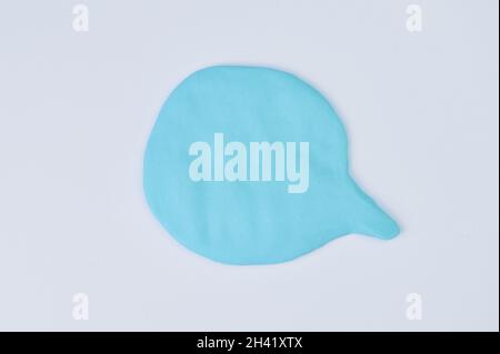blank blue speech bubble for any text on white paper Stock Photo