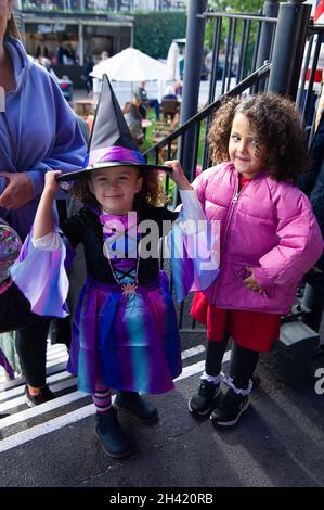 Ascot, Berkshire, UK. 30th October, 2021. It was a busy day at Ascot Racecourse today for the first of the jumps season. Families also enjoyed the funfair and Halloween activities for the children. Credit: Maureen McLean/Alamy Stock Photo