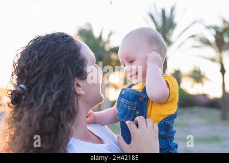 mother and daughter walking near forest Stock Photo